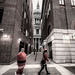 Woman standing on city street