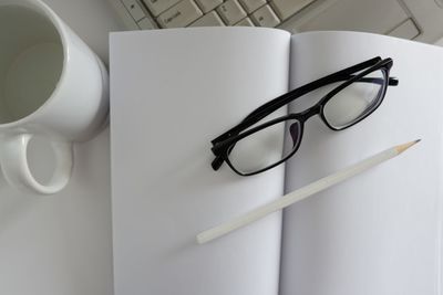 High angle view of eyeglasses on table