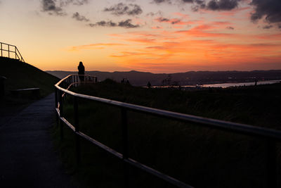 Scenic view of silhouette landscape against sky during sunset