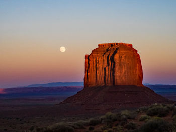 Scenic view of landscape against sky during sunset