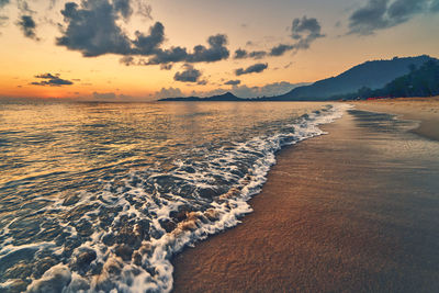 Scenic view of sea against sky during sunset