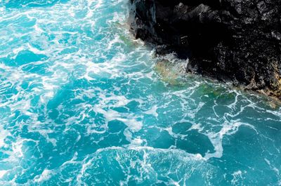 Scenic view of sea against blue sky