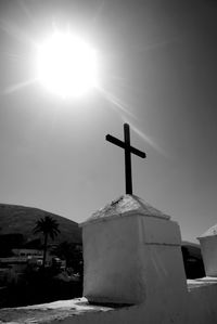 Cross against sky