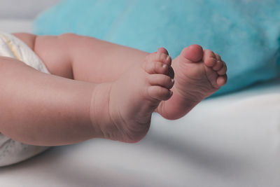 Low section of baby feet