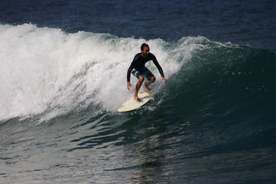 Man surfing in sea