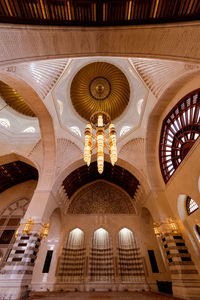 Low angle view of illuminated chandelier