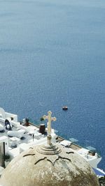 High angle view of sea against blue sky