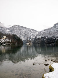 Scenic view of frozen lake against sky