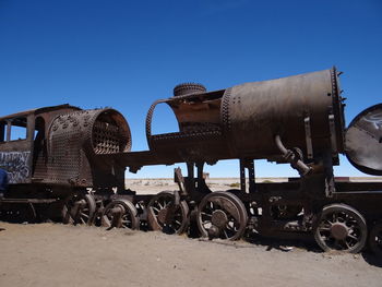 Abandoned train against clear sky