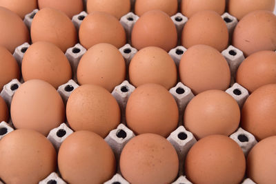 Full frame shot of eggs in container