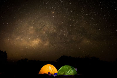 Tent against sky at night