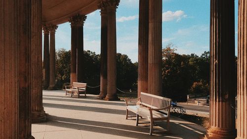 View of empty chairs in park. 