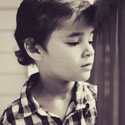 Close-up of boy looking away