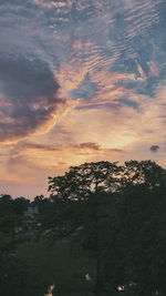 Scenic view of landscape against sky during sunset