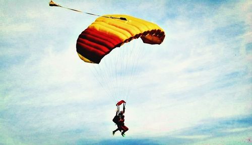 Low angle view of kite flying in sky