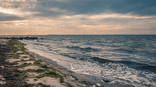 Scenic view of sea against sky during sunset