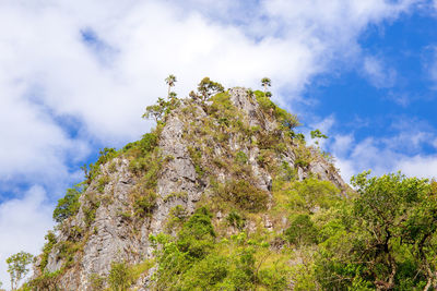 Low angle view of rocks against sky