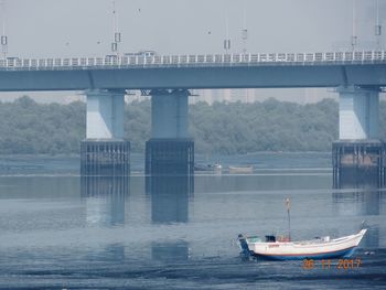 Bridge over river against sky