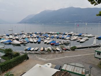 High angle view of harbor by sea against sky