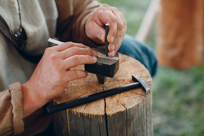 Man working on wood