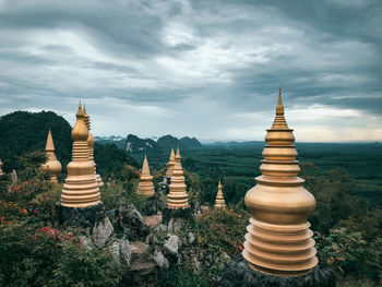 View of temple against cloudy sky