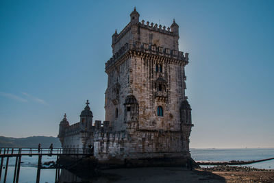 View of historical building against blue sky