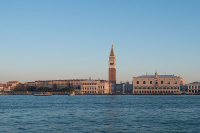 View of sea with city in background