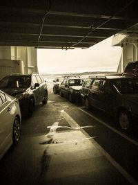 Close-up of cars on road