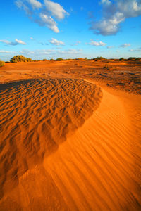 Sand against sky