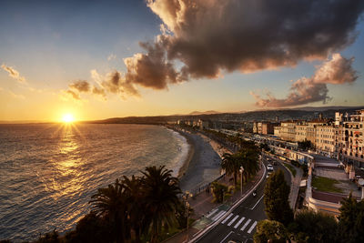 Panoramic view of beach against sky during sunset