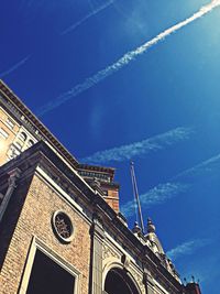 Low angle view of built structure against blue sky