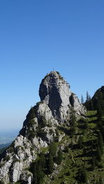 Scenic view of mountain against clear blue sky