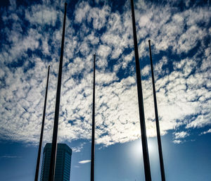 Low angle view of metal bridge against sky