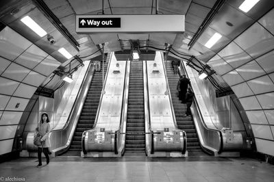 Low angle view of illuminated subway station