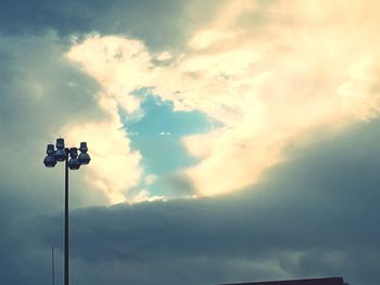 Low angle view of street light against sky