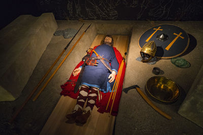 High angle view of senior man sitting at temple