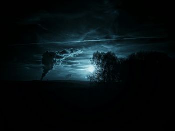 Silhouette trees against sky