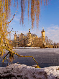 View of temple against sky during winter