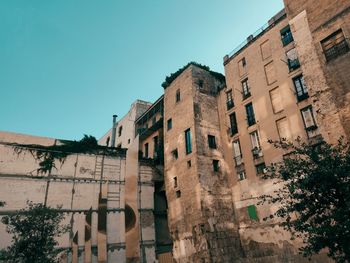 Low angle view of residential building against sky