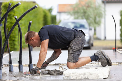 Man preparing concrete foundation