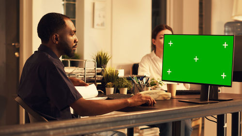 Man using laptop on table