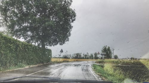 Road seen through car windshield