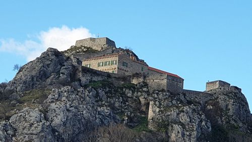 Low angle view of buildings against sky