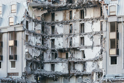 Photo of destroyed building, former hotel 5 stars, demolition of a building, house ruins