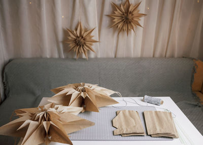 High angle view of paper decoration on table at home