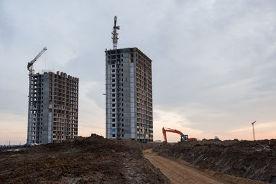 Low angle view of buildings against sky in city