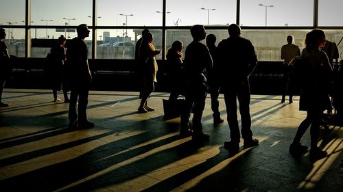 People at railroad station