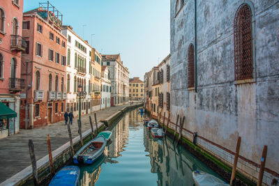 Canal amidst buildings in venice