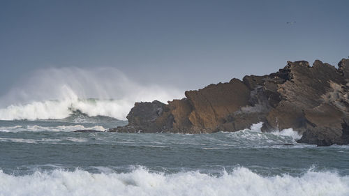 Scenic view of sea against clear sky