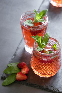 Fruits in glass on table